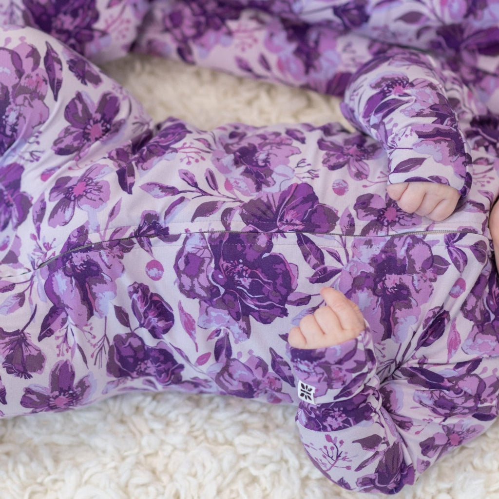 Purple floral cloud blanket fabric detail with stitched trim