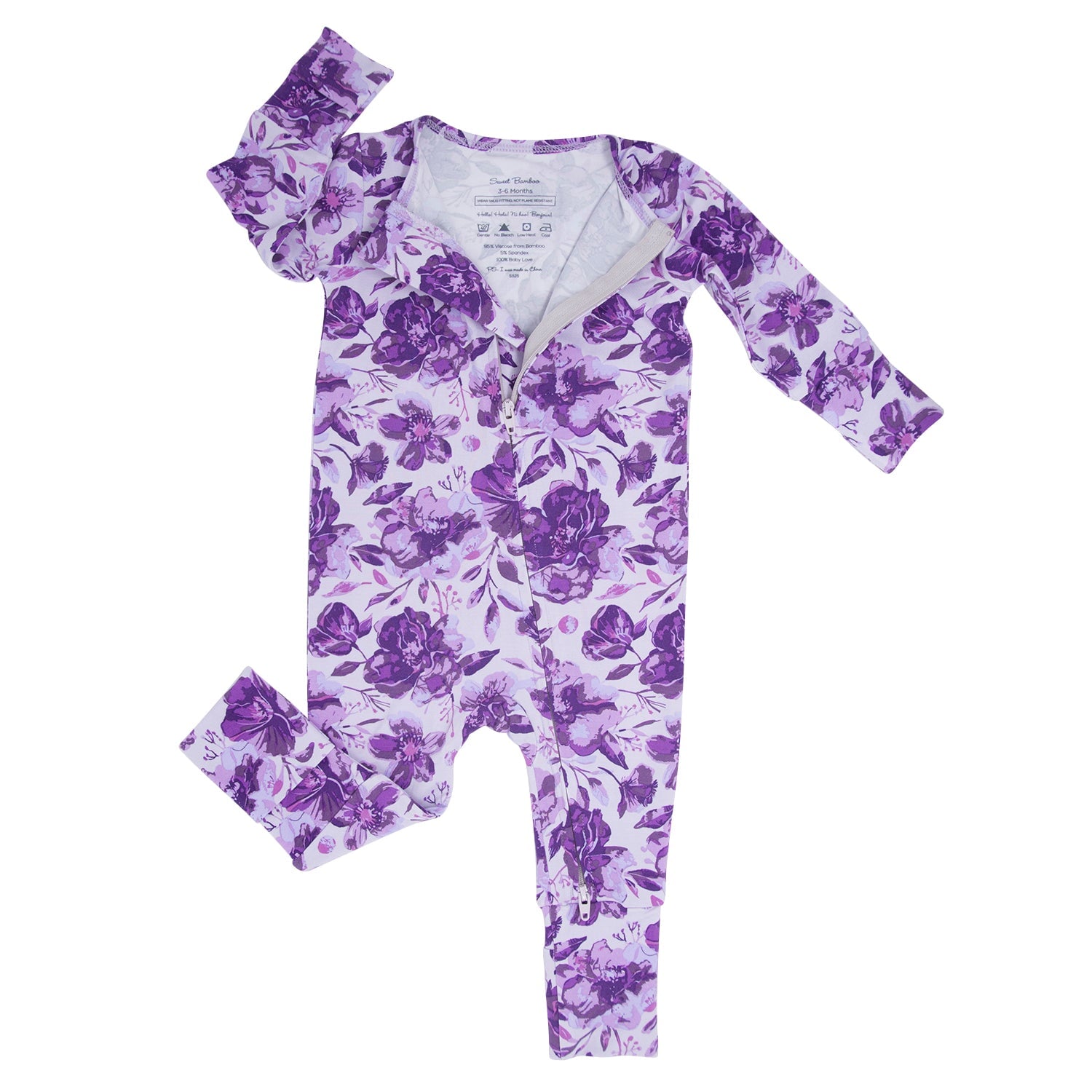 Girl's long-sleeve convertible romper with purple floral print and tag at neckline