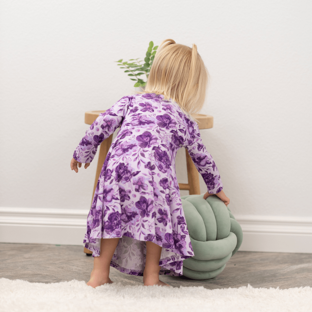 Girls purple floral long-sleeve dress, back view, gathered skirt and round neckline