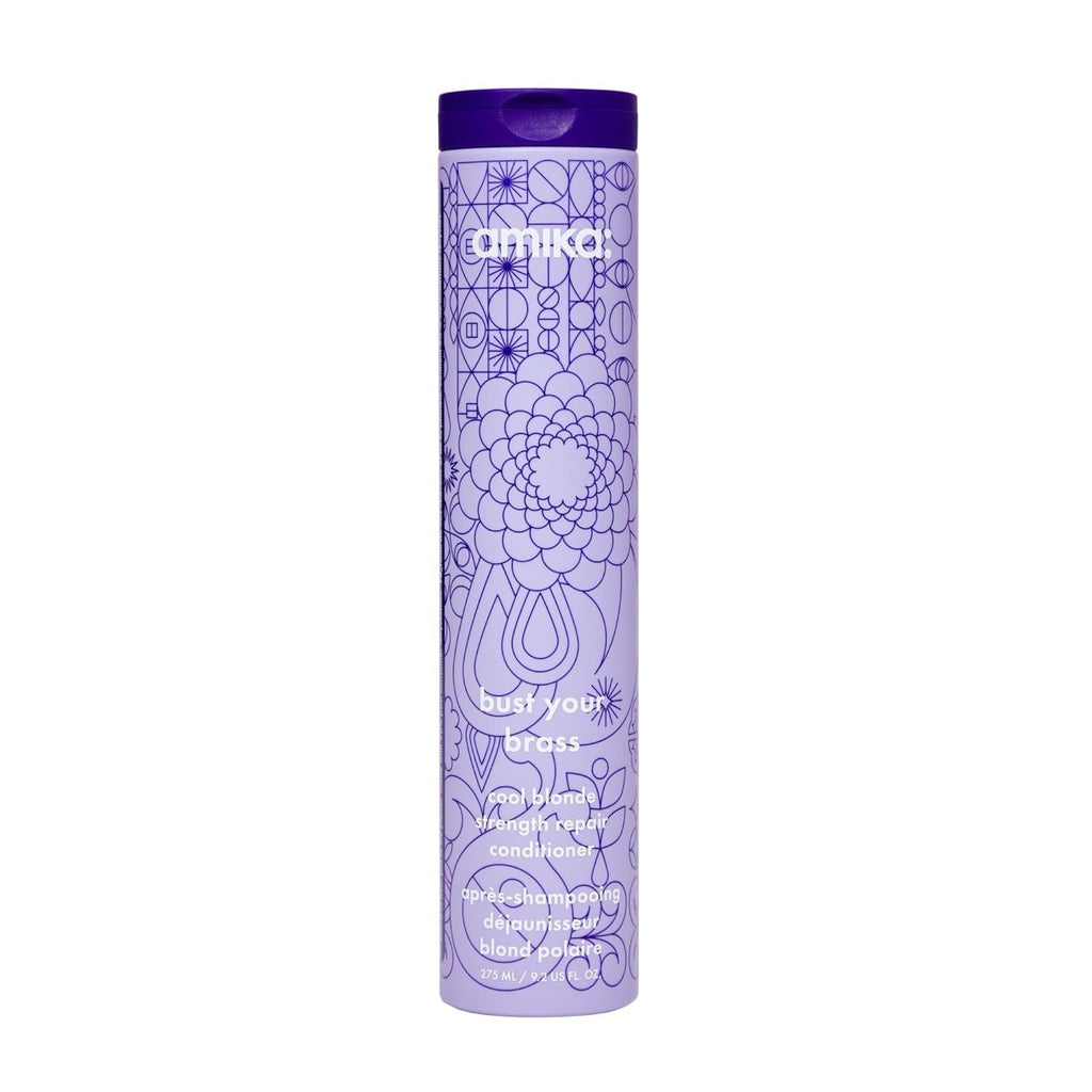 Purple hair conditioner bottle with Amika logo and decorative pattern, cap on top