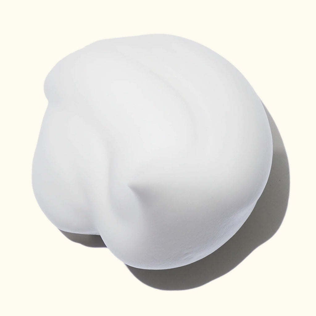White mousse dollop with soft foam texture