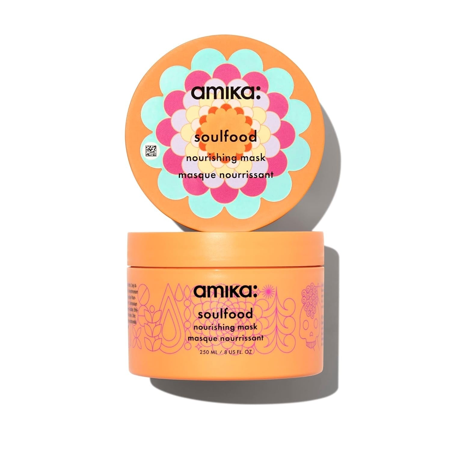 Amika Soulfood nourishing hair mask, orange tub with floral label and lid