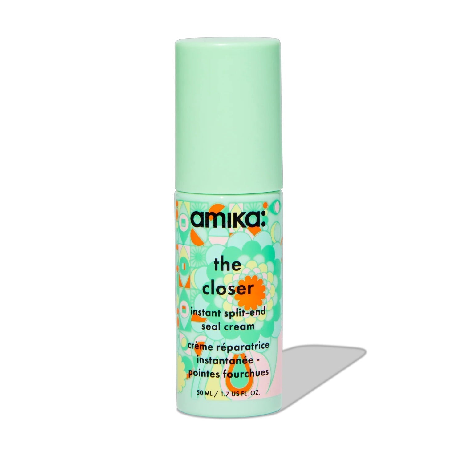 Amika split-end seal cream bottle with mint cap and floral label, 50 mL