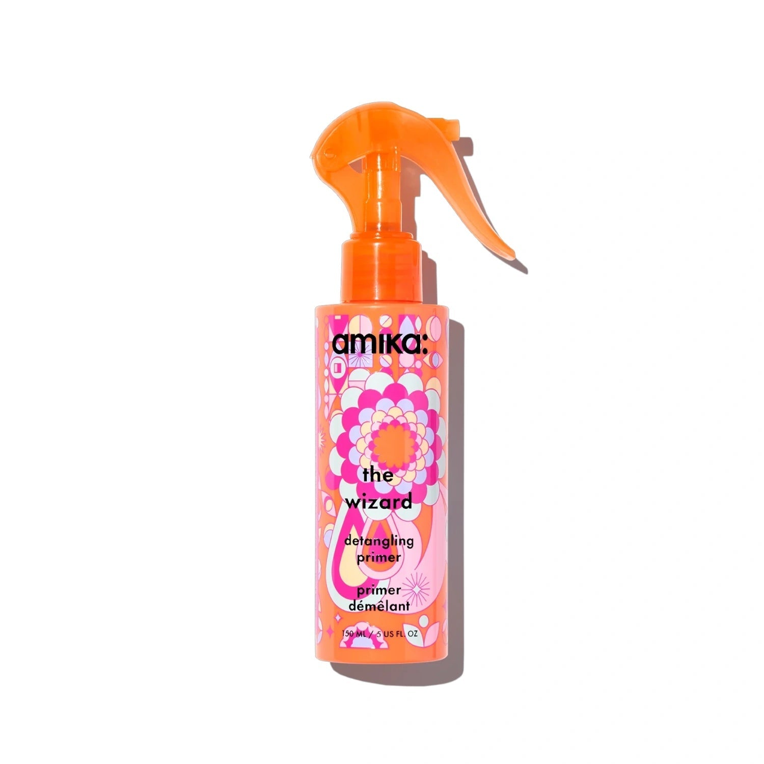 Amika detangling hair primer spray bottle, orange pump and pink floral label