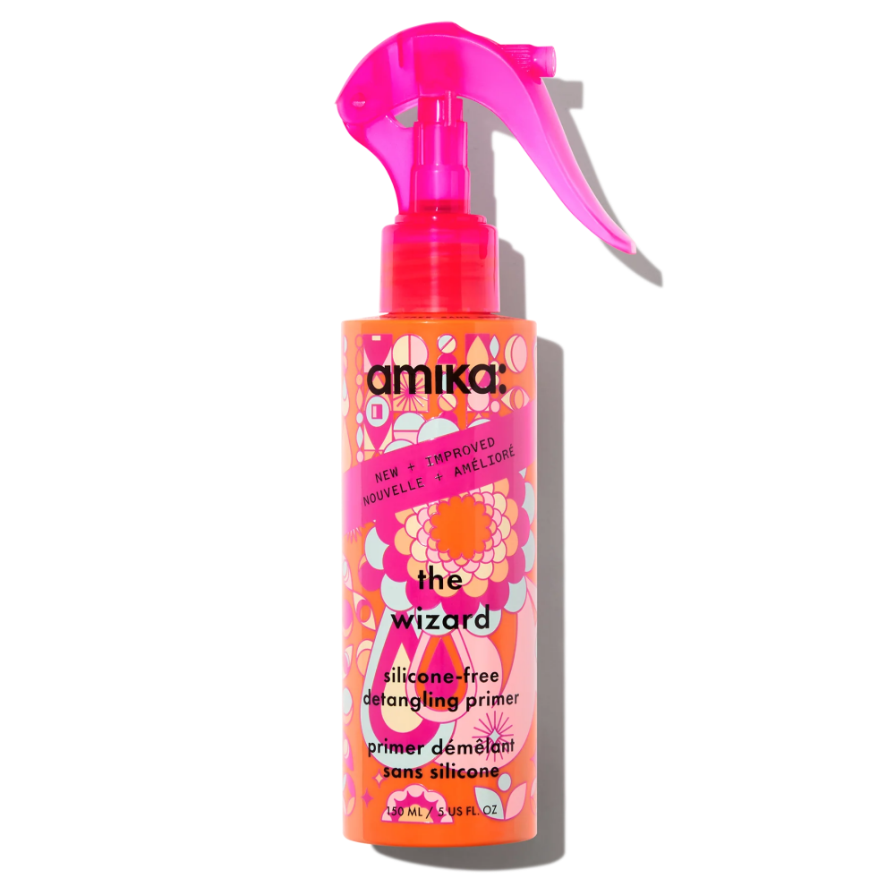 Amika detangling hair primer spray bottle, pink pump with orange floral label
