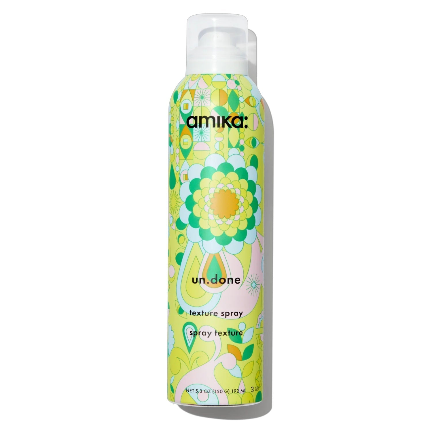 Amika un.done texture spray bottle with flip-top cap, green floral label
