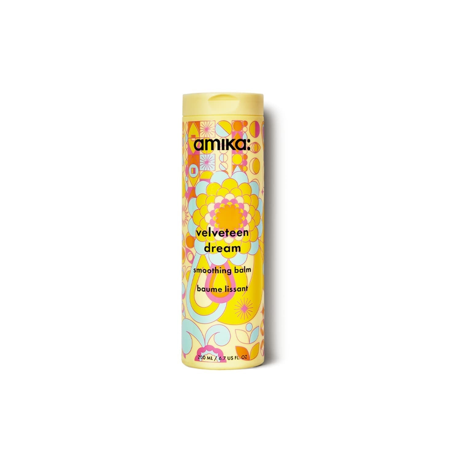 Amika Velveteen Dream smoothing balm in colorful cylindrical tube with flip-top cap