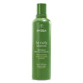 Green Aveda shampoo bottle, be curly advanced label on front
