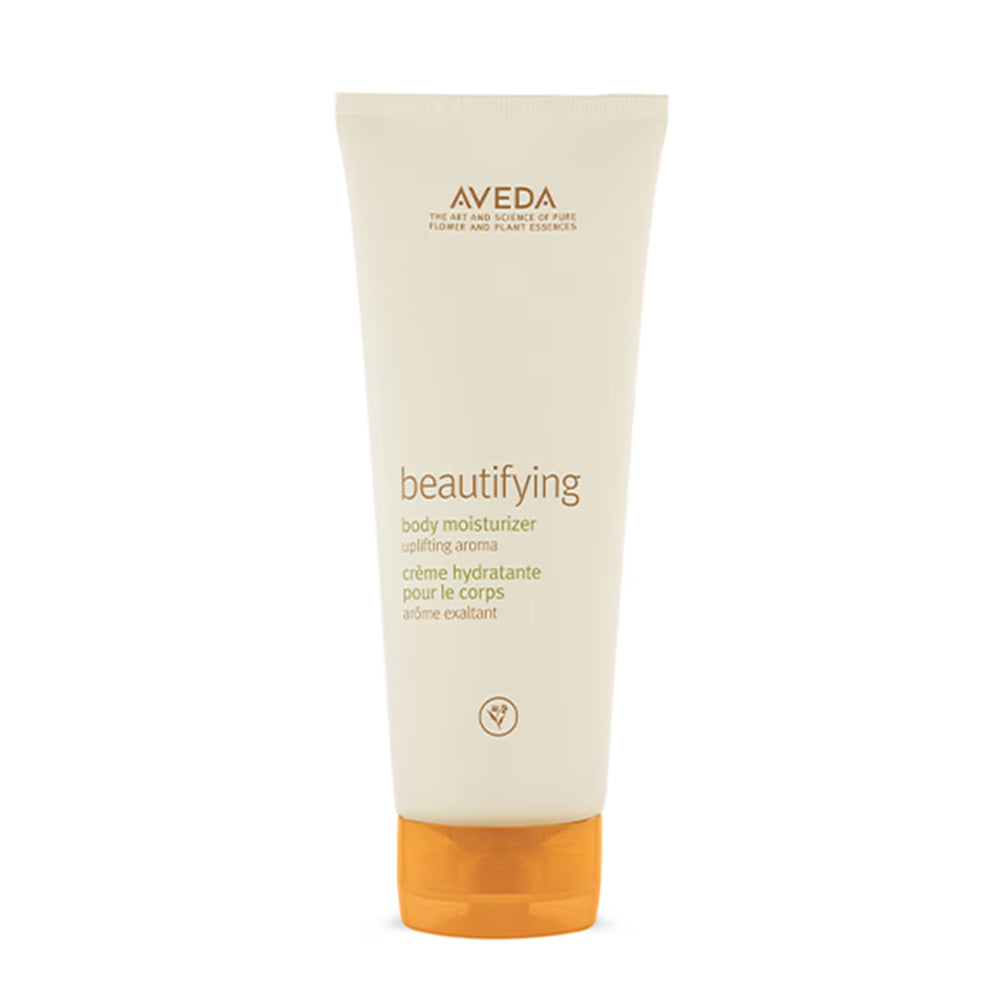 Body moisturizer tube, beige cream with orange cap