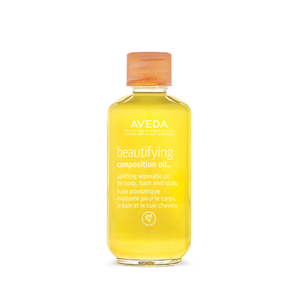 Aveda beautifying composition oil bottle, yellow glass with orange cap, 50 ml