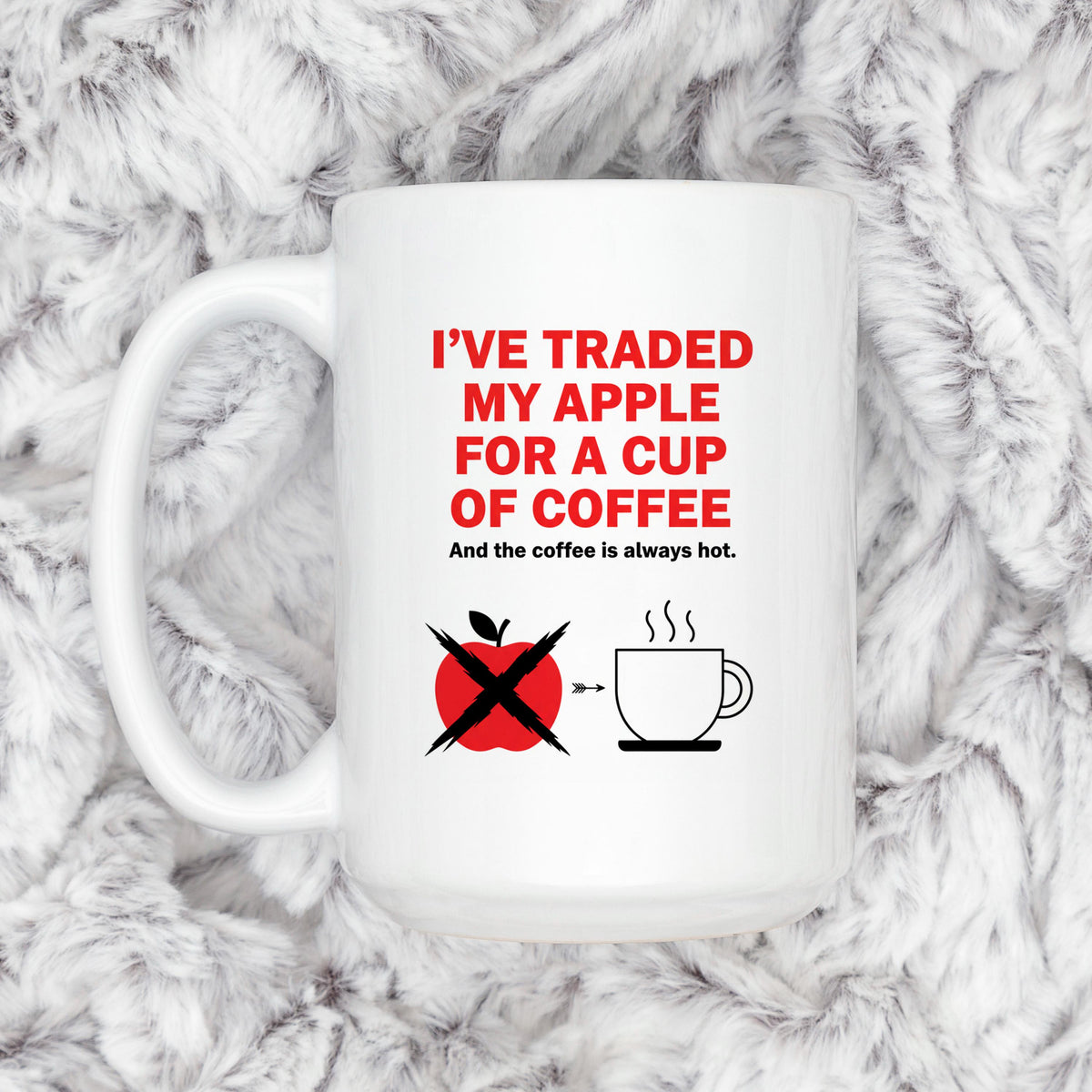 White ceramic mug with red 'I've traded my apple for a cup of coffee' crossed apple icon