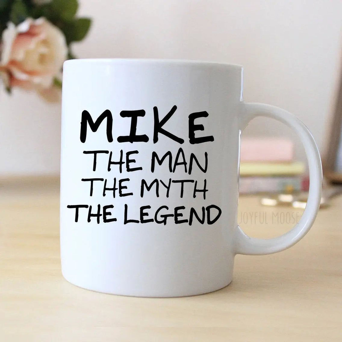 White coffee mug with large black "MIKE THE MAN THE MYTH THE LEGEND" graphic