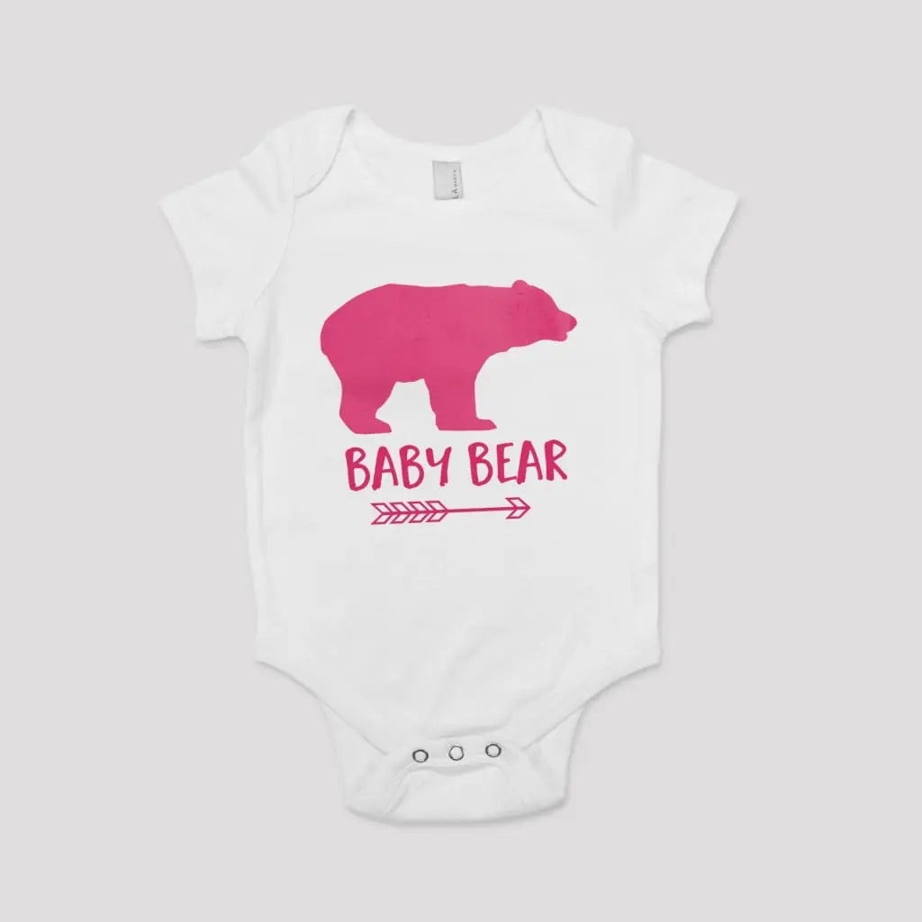 White short-sleeve baby onesie with pink bear graphic and BABY BEAR text