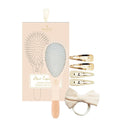 Hair essentials 4-piece set with paddle brush, hair clips, and bow hair tie