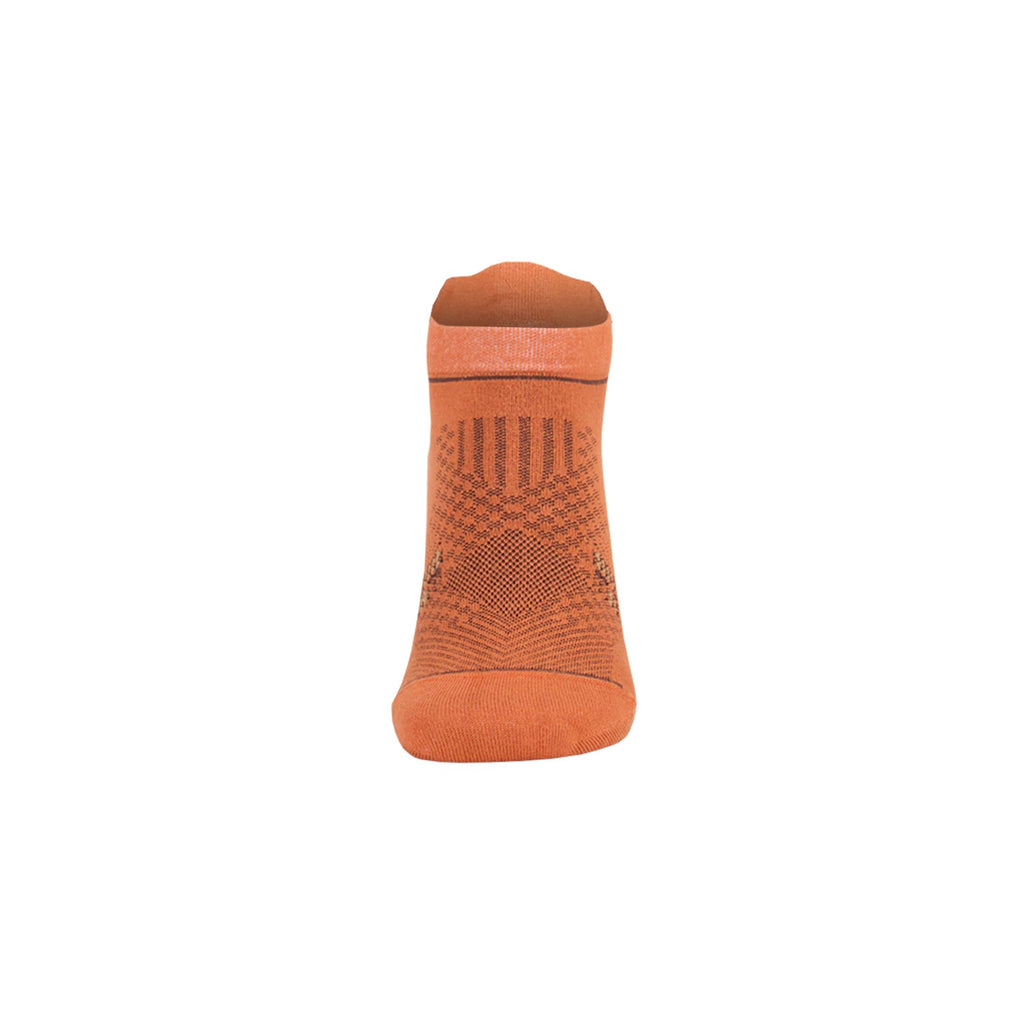 Orange ankle socks with dark geometric knit pattern along the back