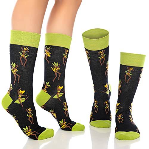Crew socks with black fabric, neon green cuffs, and yellow cat illustration patterns.