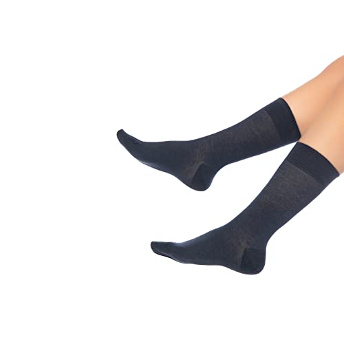 Navy crew socks pair on model legs, cushioned knit at heel