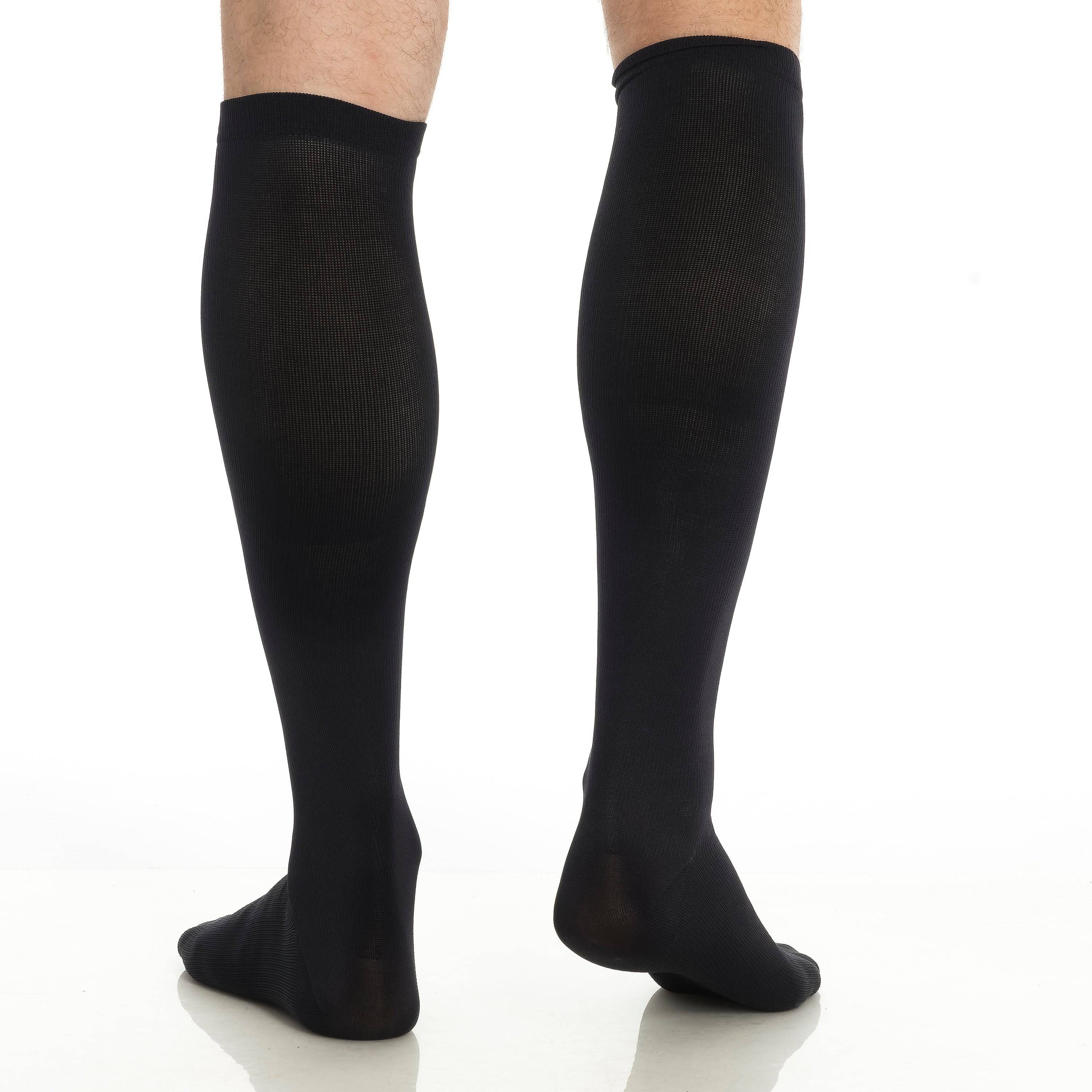 Black knee-high compression socks with ribbed texture
