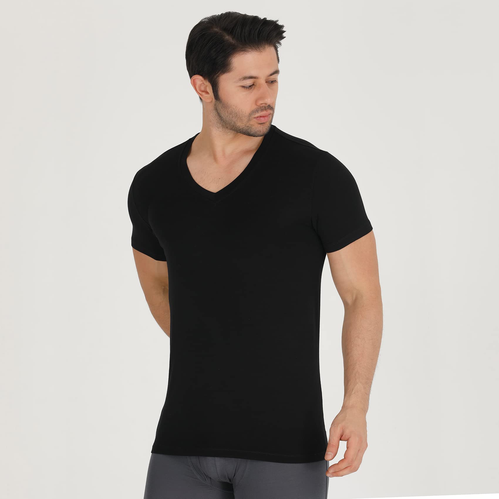 Men's black V-neck undershirt, short-sleeve fitted tee on model