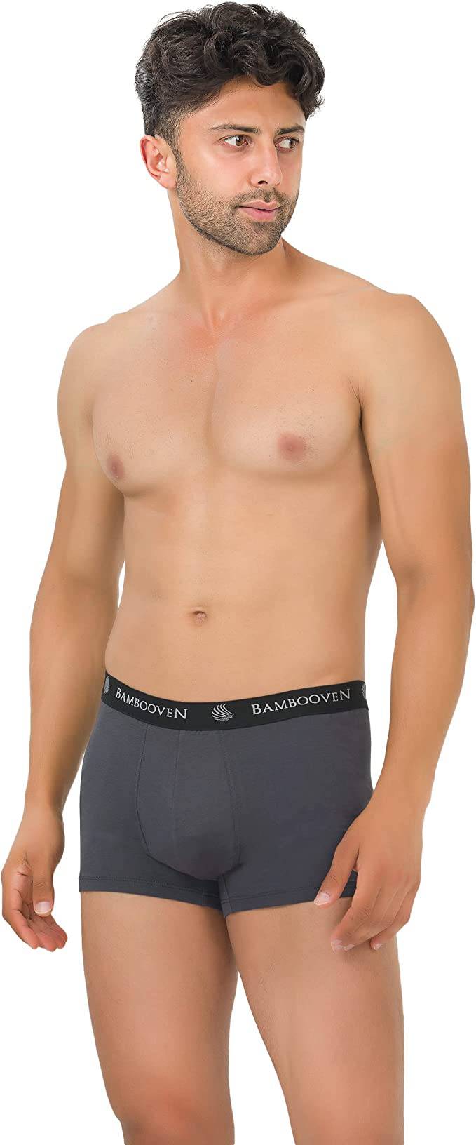 Men's bamboo boxer trunks with logo waistband, dark gray on model, front view