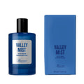 Baxter Valley Mist eau de parfum bottle with black cap and blue glass, plus blue box