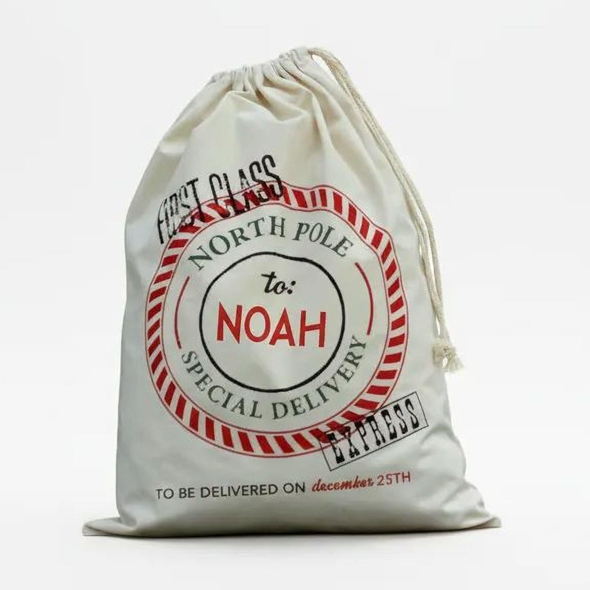Front view of cream canvas drawstring Santa bag with North Pole seal for Noah.