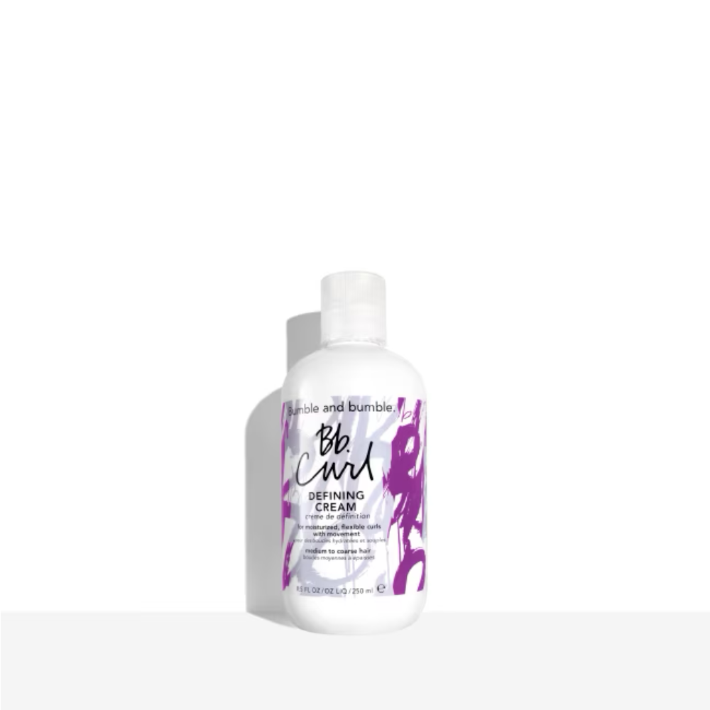 Bumble and Bumble Curl Defining Cream bottle, white plastic, purple label