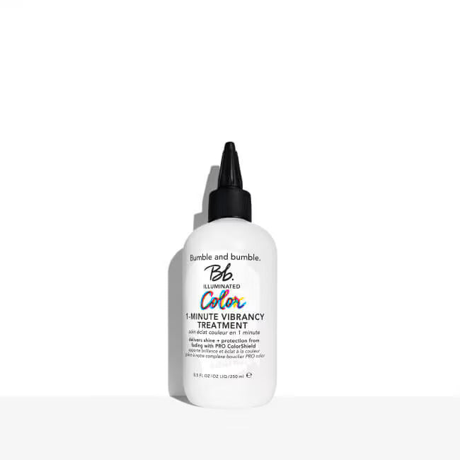 Hair treatment bottle with black pump and white label, 8.5 oz.
