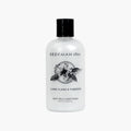 Beekman 1802 goat milk conditioner bottle, white with black cap and floral label
