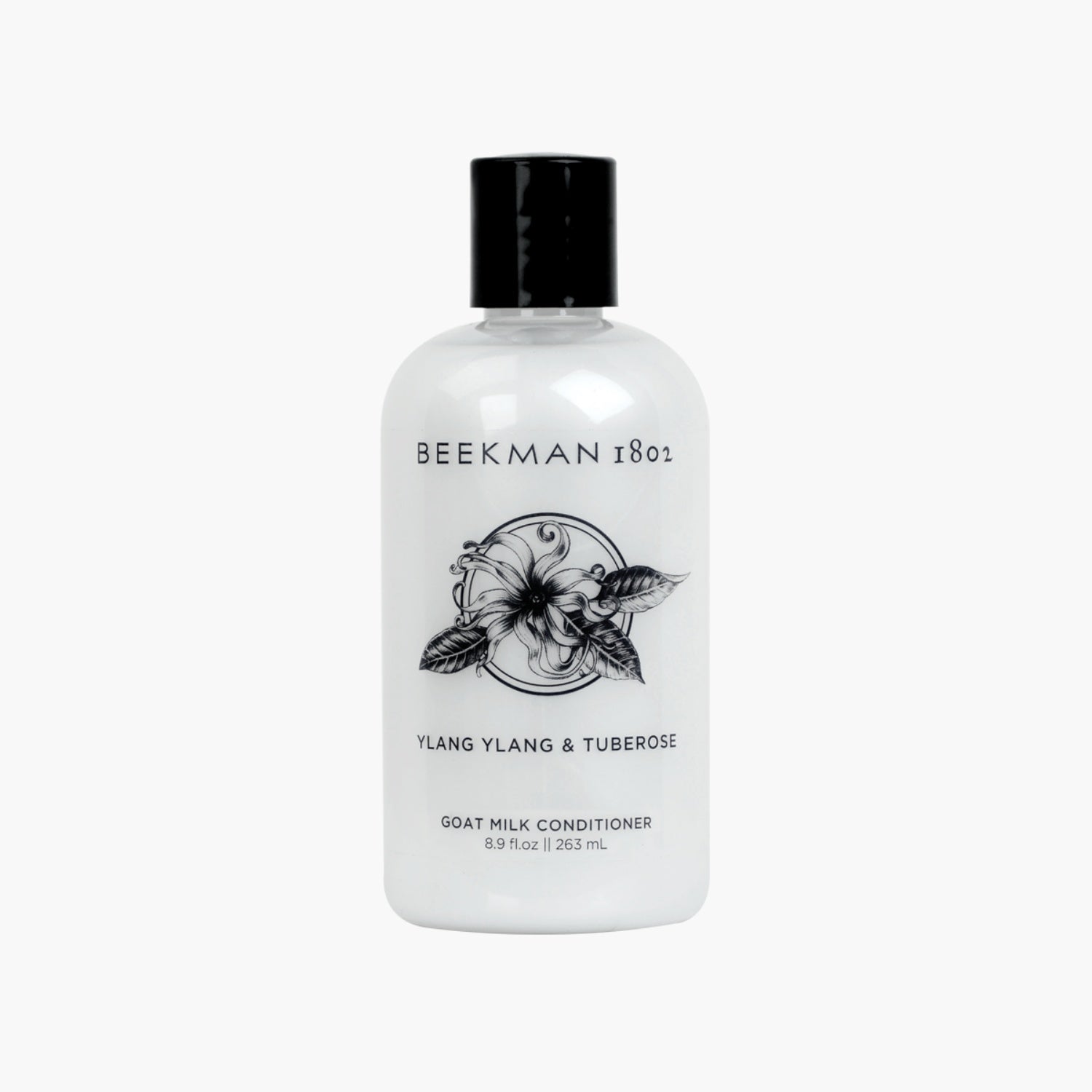 Beekman 1802 goat milk conditioner bottle, white with black cap and floral label