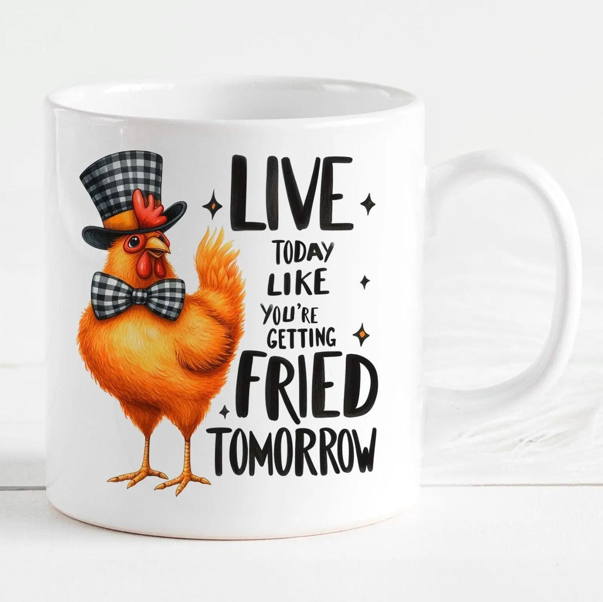 White ceramic chicken mug with orange cartoon hen and LIVE…FRIED TOMORROW slogan