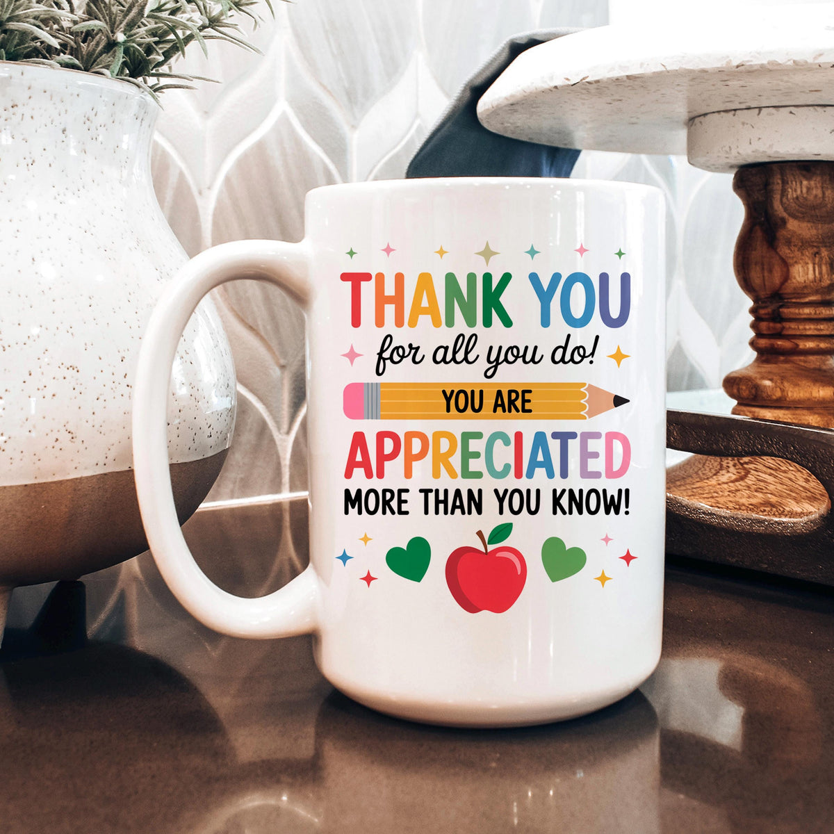 White ceramic thank-you mug with colorful “Thank You” and “You are appreciated” message