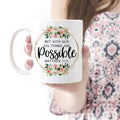 White ceramic coffee mug with floral wreath 'All things are possible' (Matthew 19:26)