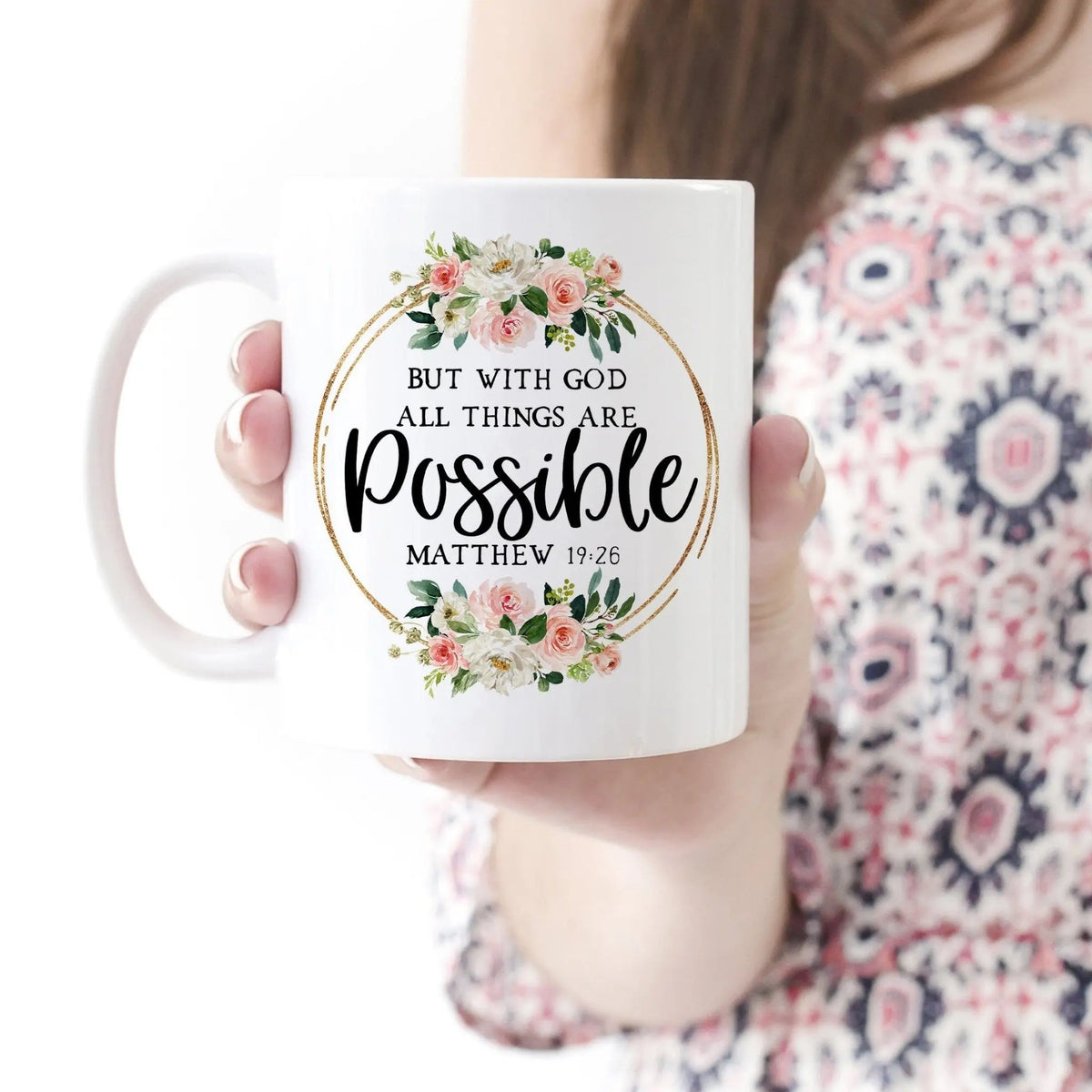 White ceramic coffee mug with floral wreath 'All things are possible' (Matthew 19:26)