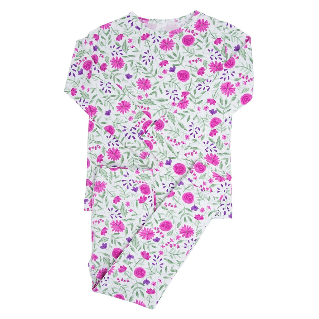 Girls floral pajama set, white background with pink flower print and short sleeves
