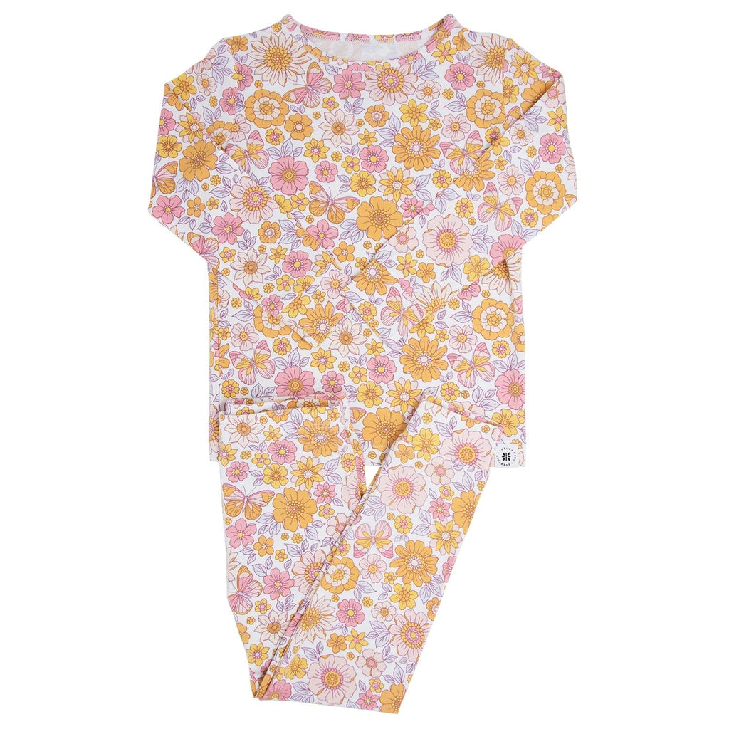 Kids floral pajama set: long-sleeve top and pants, pastel yellow, pink, and lavender