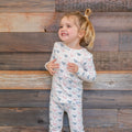 Kids bamboo pajama set with white base and blue/pink farm hen print, long sleeves