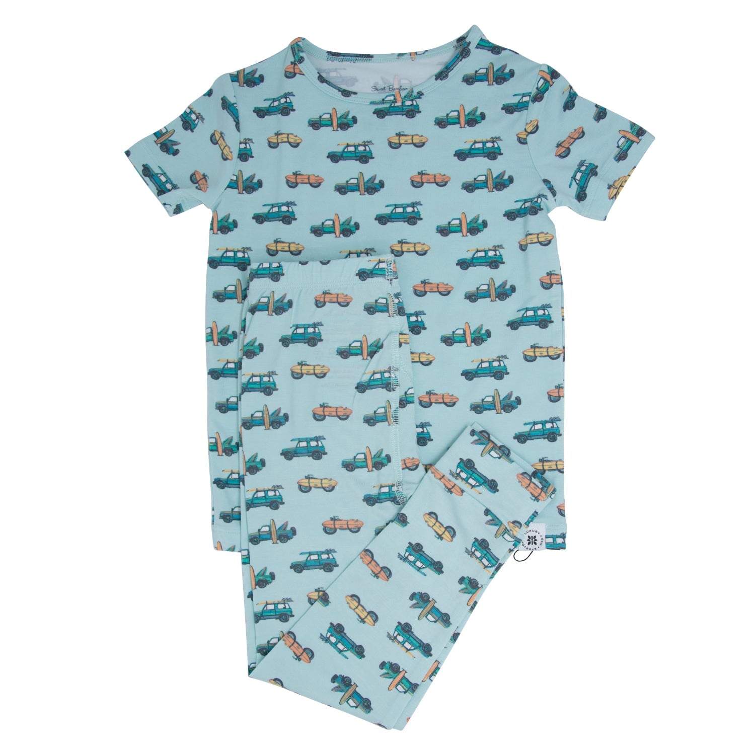Kids' short-sleeve pajama set in light blue with colorful tractor print, crewneck top
