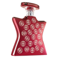 Maroon perfume bottle with metal cap and NYC emblem pattern
