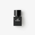 Eau de parfum bottle, black glass with silver cap and Mr. Burberry label
