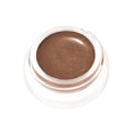 RMS buriti bronzer in a clear jar, bronze powder