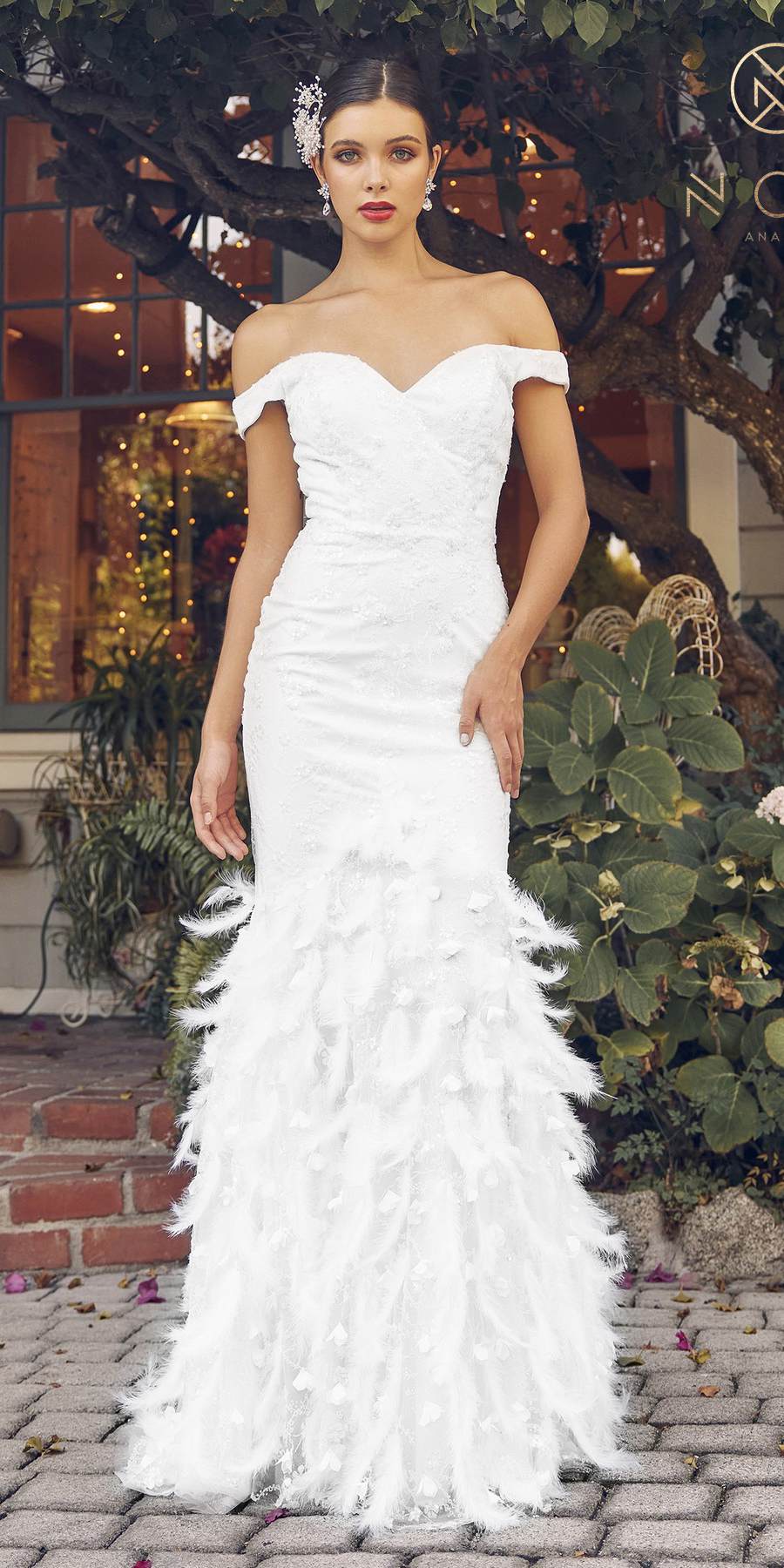 White off-shoulder mermaid gown with feathered ruffle hem, fitted bodice