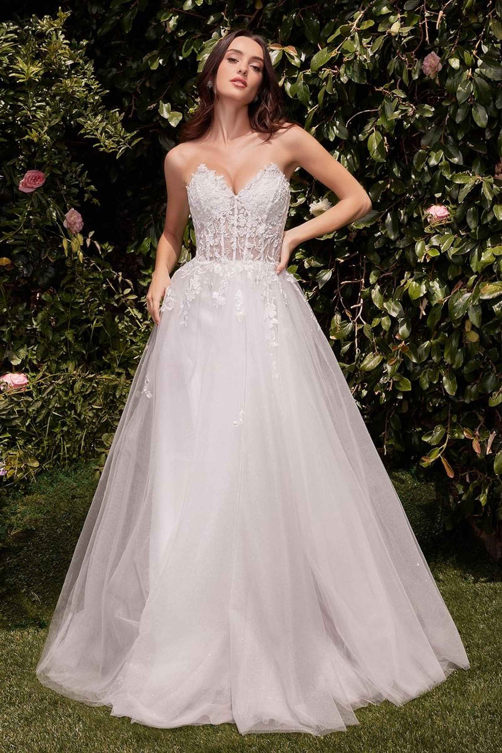 Off-white strapless A-line wedding dress, lace corset bodice, full tulle skirt