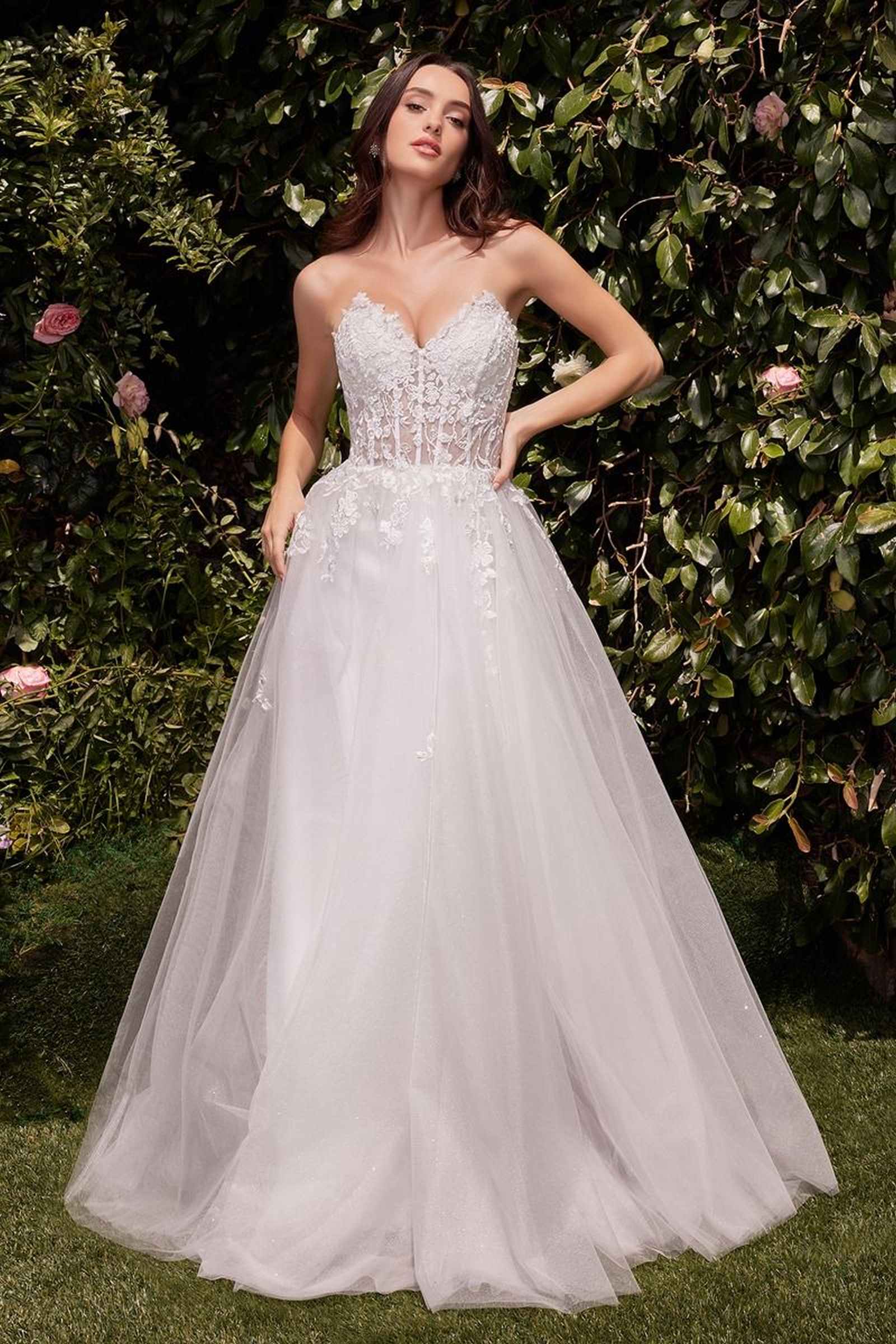 Off-white strapless A-line wedding dress, lace corset bodice, full tulle skirt