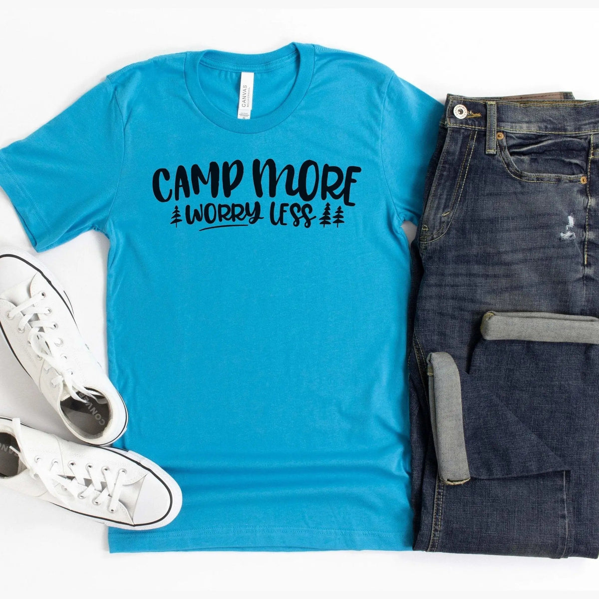 Blue T-shirt with 'CAMP MORE WORRY LESS' camping graphic and pine tree print