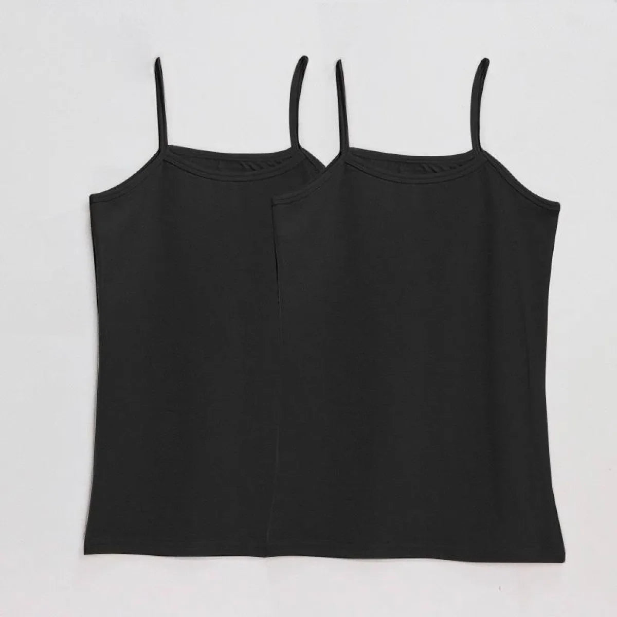 Pair of black spaghetti-strap camisole tops with scoop neck and straight hem.