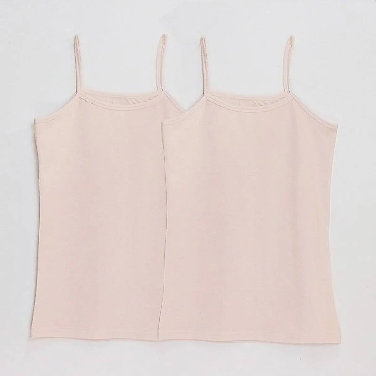Pair of light pink spaghetti-strap camisole tops with scoop neck and straight hem.