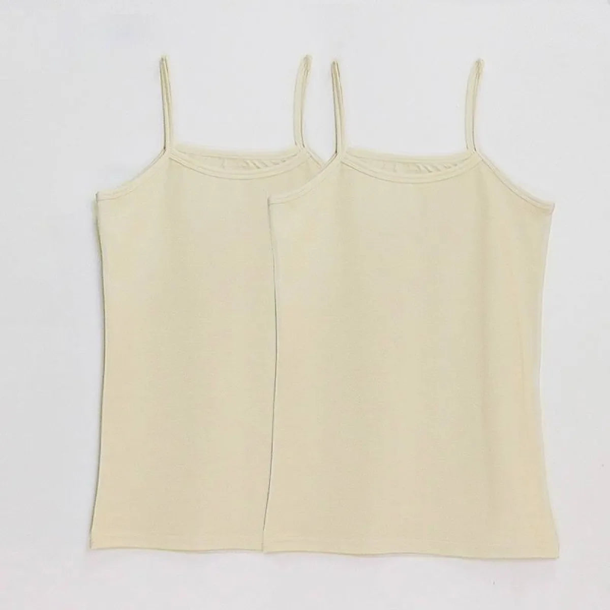 Pair of pale khaki spaghetti-strap camisole tops with scoop neck and straight hem.