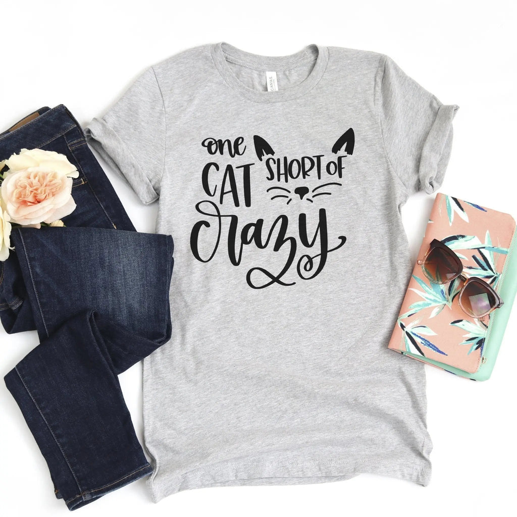 Light gray crew-neck cat T-shirt with black cat graphic, short sleeves