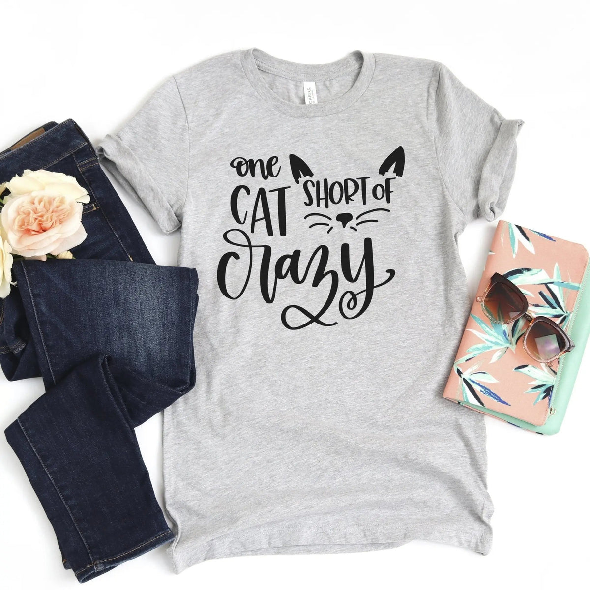 Light gray crew-neck cat T-shirt with black cat graphic, short sleeves